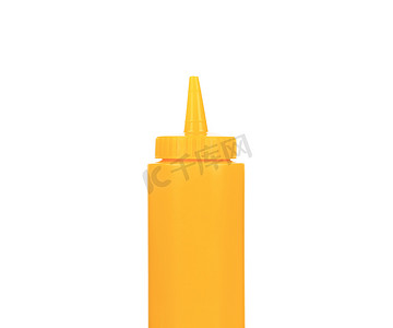 调味瓶摄影照片_调味汁的黄色塑料容器。