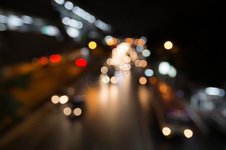 城市夜市摄影照片_路灯博上的夜市抽象模糊交通城市