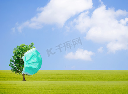 保护环境海报摄影照片_戴口罩保护环境的概念树