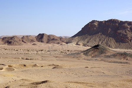 埃及沙漠有山背景。