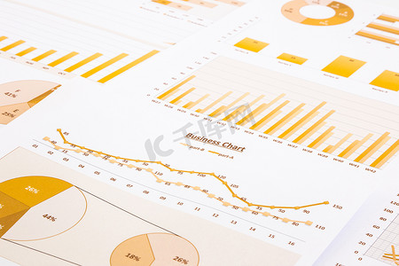 行政年终总结摄影照片_黄色商业图表、图表、报告和总结背景