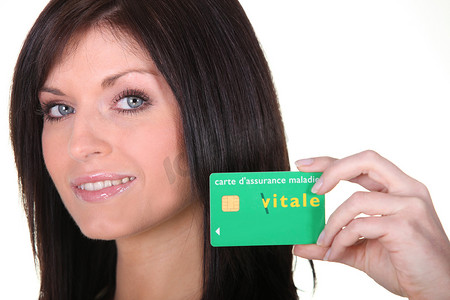 法国女士摄影照片_持有法国 Carte Vitale 健康卡的女士