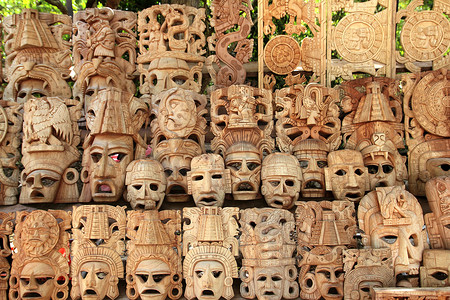 面具装饰摄影照片_玛雅木面具排墨西哥手工艺人脸