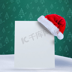 圣诞节合成海报摄影照片_海报上圣诞老人帽子的合成图像