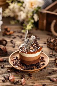 咖啡甜摄影照片_巧克力和咖啡蛋糕