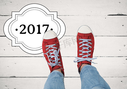 新年跑步摄影照片_2017年新年愿望与穿红色运动鞋的少年