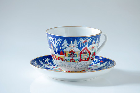 茶馆图案摄影照片_带有冬季图案的圣诞杯