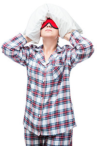 pi摄影照片_穿睡衣的女人睡不着，用 pi 盖住头