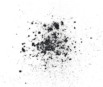 白色粒子摄影照片_白色背景中的木炭颗粒
