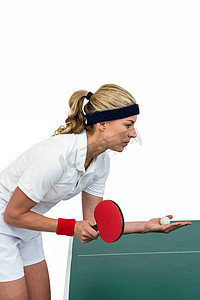 打桌球摄影照片_打乒乓球的女运动员