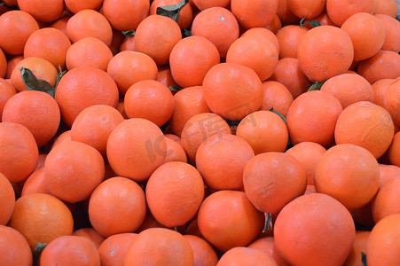 橙色果树摄影照片_杂货店的绿色杂货店和新鲜橙色图片