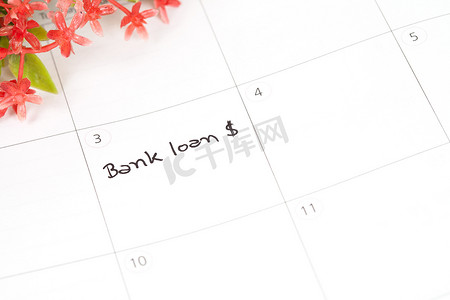 银行贷款贷款摄影照片_在日历中提醒“银行贷款”