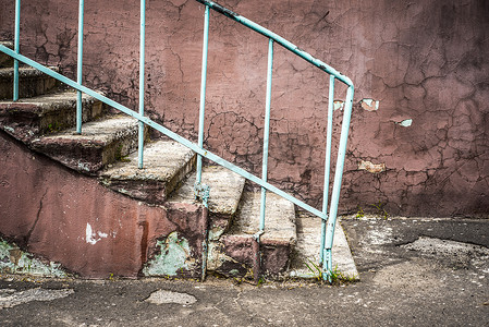 粉色台阶摄影照片_老破旧的台阶的片段