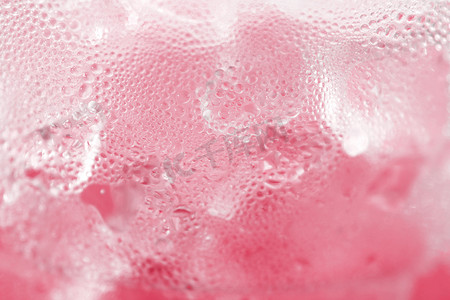 水滴苏打冰烘焙背景清新凉爽的冰粉色质地，选择性聚焦