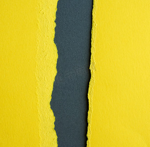 分层黄色撕纸的背景，黑色上有阴影
