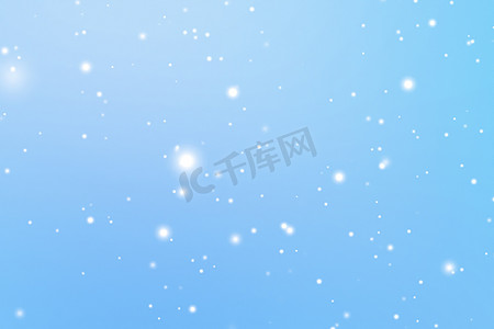 寒假和冬季背景，白雪落在蓝色背景上，雪花散景和降雪颗粒作为圣诞节和下雪假期设计的抽象雪景