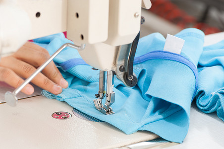 缝纫工人摄影照片_纺织服装厂
