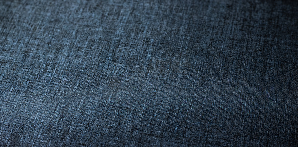 装饰亚麻蓝色牛仔裤面料纹理背景，用于室内、家具设计和时尚标签背景
