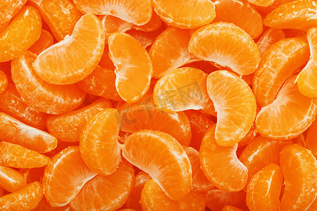 许多多汁的橘子片作为背景纹理。
