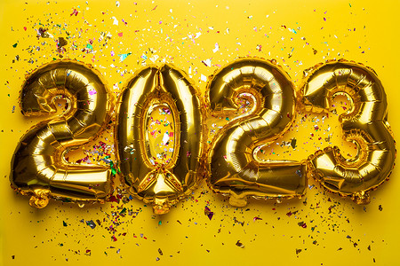 2023喜庆摄影照片_金箔气球的 2023 年新年快乐概念