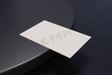 黑白地板背景摄影照片_黑白名片纸样机模板，带有空白空间封面，用于在黑色铬地板背景上插入公司徽标或个人身份。