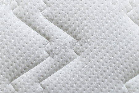 白色床垫纹理背景特写镜头。