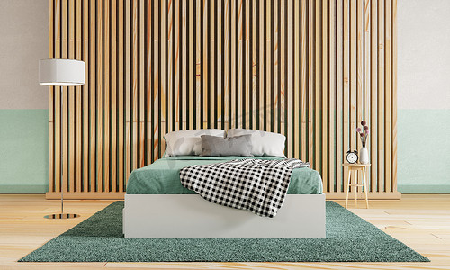 空卧室摄影照片_有木地板和隔墙的绿色卧室和白色绿色未加工的混凝土背景。