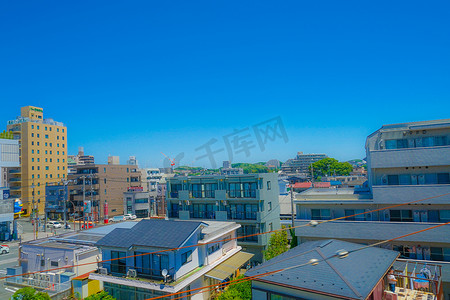 住宅区摄影照片_多摩地区的住宅区和蓝天