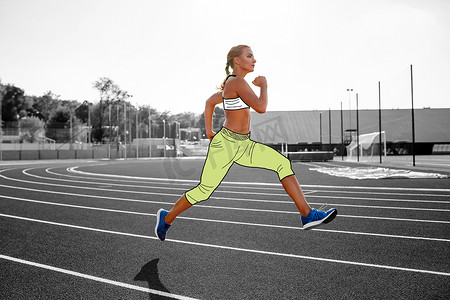 卡通天空摄影照片_穿着卡通运动服的女运动员正在专业体育场的跑道上跑步。