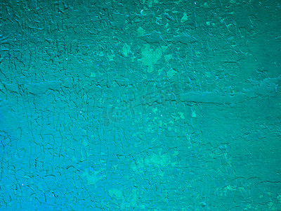 墙面艺术油漆摄影照片_损坏的风化绿色背景，旧有油漆磨损的金属墙面纹理。