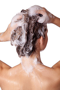 洗澡摄影照片_美丽的女人洗澡和洗头。