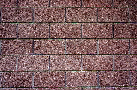 大樱桃色长方形石头作为背景的墙壁