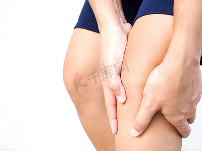 亚洲泰国摄影照片_泰国亚洲人腿部疼痛和膝盖疼痛的身体特写