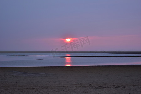 北海摄影照片_北海海滩色彩缤纷的日落
