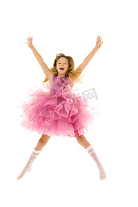 开心心情摄影照片_小女孩跳得很开心。好心情的概念。