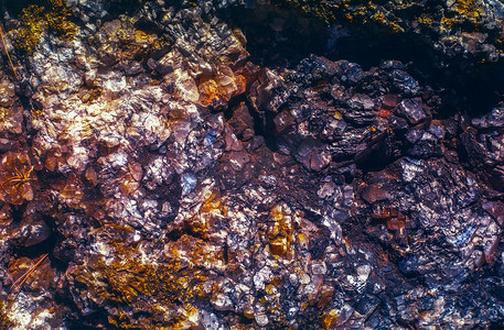 彩色岩石摄影照片_抽象彩色岩石石头背景