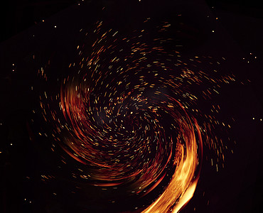 火火的摄影照片_旋转的火火花从燃烧的火