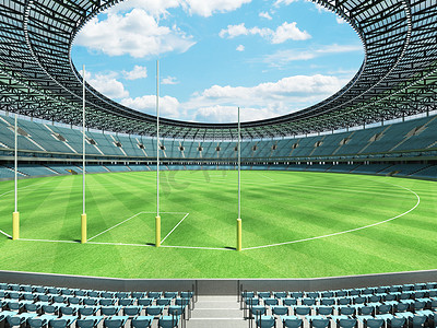美丽的现代圆形澳大利亚规则足球场，配有天蓝色座位和 VIP 包厢