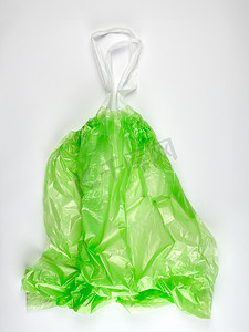 带把手的空透明绿色塑料垃圾袋