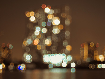 离焦模糊城市夜景灯光多彩散景抽象首都城市建筑背景。