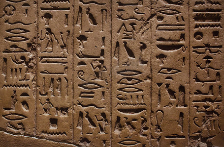 埃及人摄影照片_刻在石墙上的古埃及象形文字