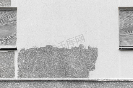 建筑立面上的白色画笔笔触、灰色抽象图案墙面纹理外部背景