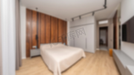 豪华和现代卧室酒店公寓室内设计的离焦和模糊照片。