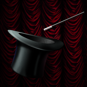 魔杖摄影照片_红色舞台幕布上隔离的魔法黑帽和魔杖