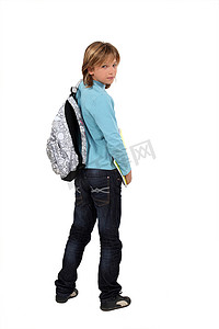 男背摄影照片_背着背包的男小学生