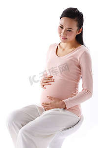 幻想图片摄影照片_孕妇手放在肚子上
