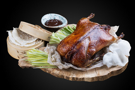 木板刻画摄影照片_木板上的北京烤鸭
