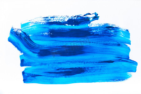 抽象画用明亮的蓝色刷子笔触在白色  