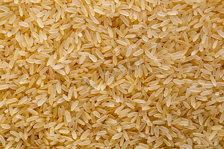 糙米。饮食与健康饮食的概念，稻米的背景质感。糙米结构的宏观摄影.为健康饮食而食用无麸质的古代谷物,上图.