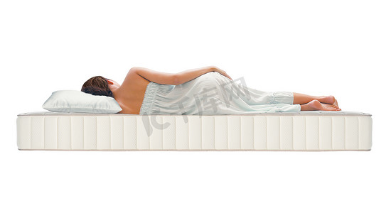 椰棕床垫摄影照片_睡在骨科床垫上的妇女